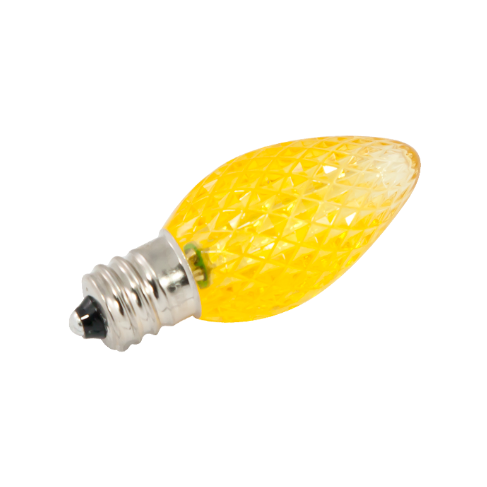 Yellow faceted C7 LED bulb with E12 candelabra base and polycarbonate lens; approx 2.09 in long, designed for vivid, energy-efficient color.
