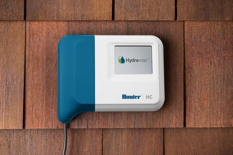 Open view showing internal terminal strip and wiring area of Hunter HC-1200i Hydrawise 12-station indoor Wi-Fi controller for installer reference