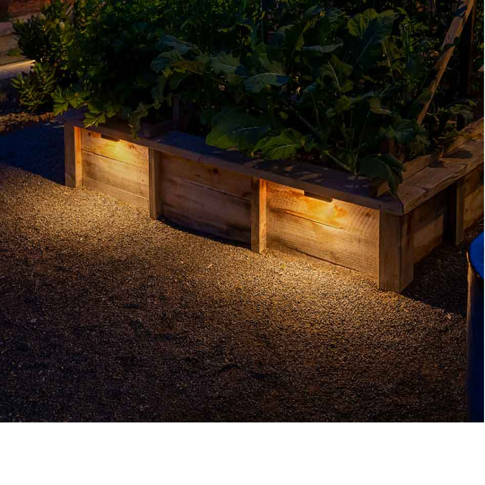 Main canvas image of FX LD Ledge Light illustrating overall compact form factor under 5 inches wide, die-cast aluminum body and warm LED glow.