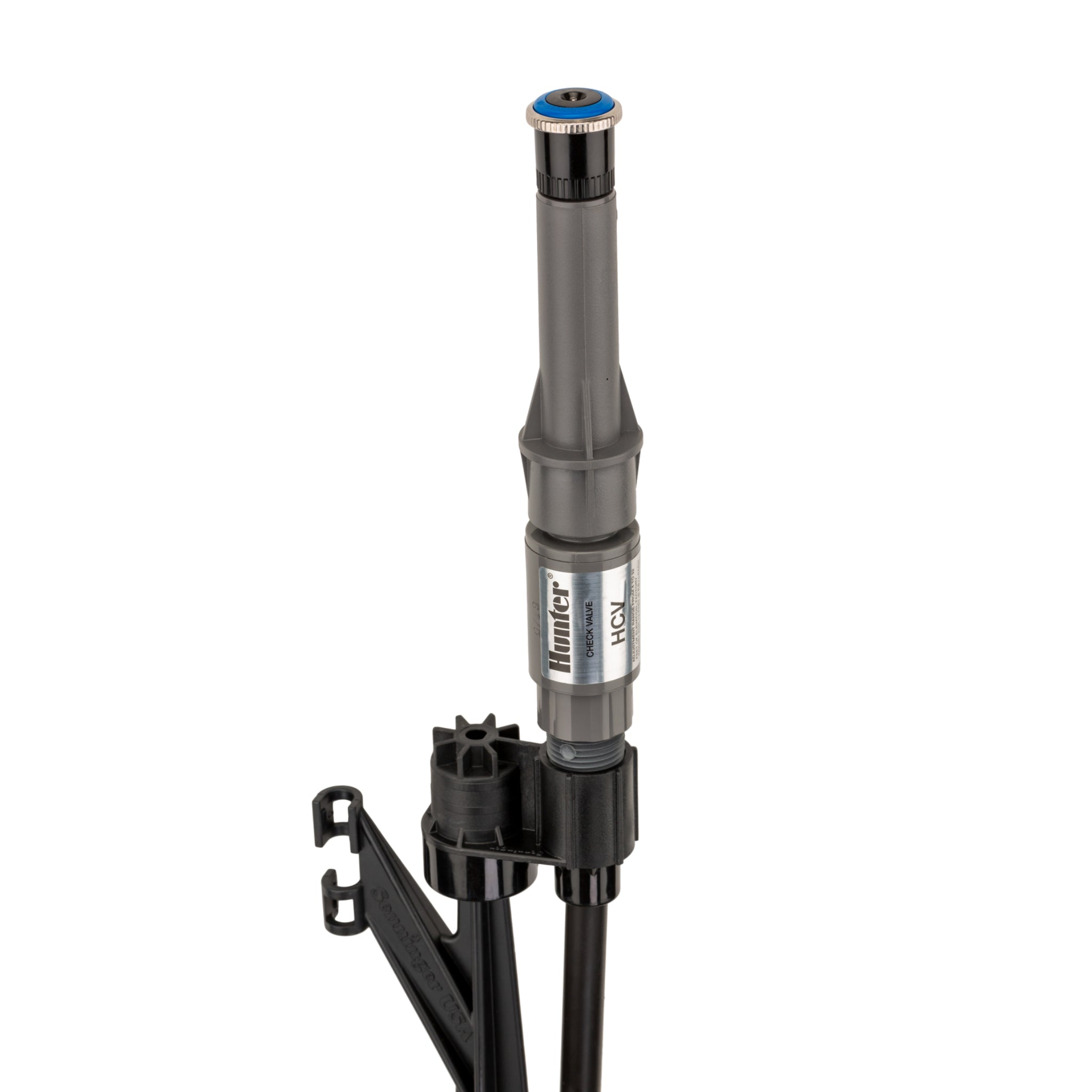 Close view of the MP Stake kit plumbing: 0.345-inch polyethylene tubing connected to a ½-inch male threaded fitting and PROS-00-PRS40 pressure-regulated adapter.