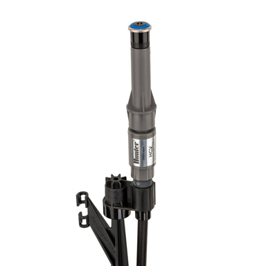 Close view of the MP Stake kit plumbing: 0.345-inch polyethylene tubing connected to a ½-inch male threaded fitting and PROS-00-PRS40 pressure-regulated adapter.