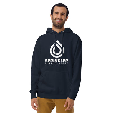 Front view of navy blazer unisex premium hoodie on white background, showing pouch pocket, hood, flat drawstrings, and subtle self-fabric back patch detail.